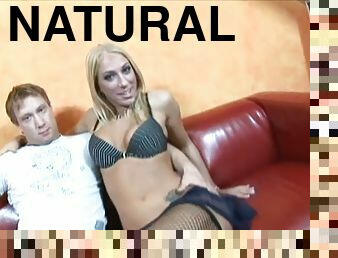 Dionne Darling the blonde in fishnets fucks on a sofa