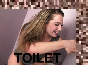 Immaculate cowgirl goes wild on a gloryhole fuckrod in the toilet