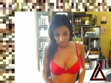 Hot Latina with implants masturbates on webcam