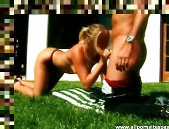 Licking and finger fucking a horny blonde outdoors