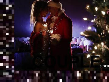 Aroused blonde plays erotic with her Santa in a midnight porn