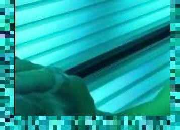 hot guy blows his giant load all over tanning booth! best cumshot ever