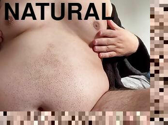Chubby fat guy with big natural tits uses a vibrator on his nipples