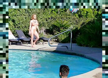 Krissy lynn gives the lucky young man an underwater handjob