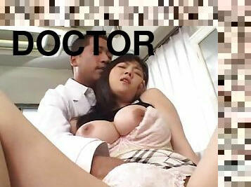 Doctor fingers her busty Japanese patient