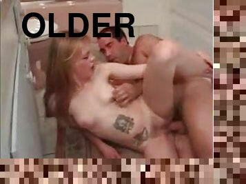 Tattooed teenager takes older man cock in bathroom