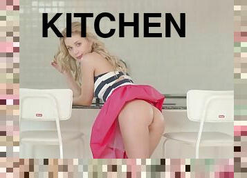 Darling babe is naked in the kitchen in this video
