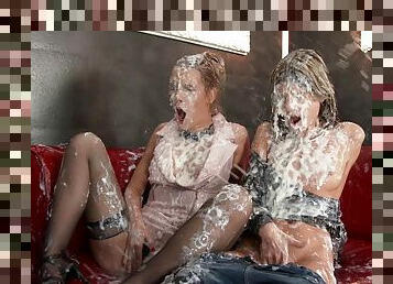 Girlfriends go to a gloryhole and gets drenched in cream