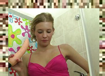 In the shower this hottie drills her fuck hole with her toy