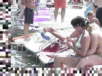 Bikini clad pornstar shows off her sexy ass at a wild bikini party at the lake