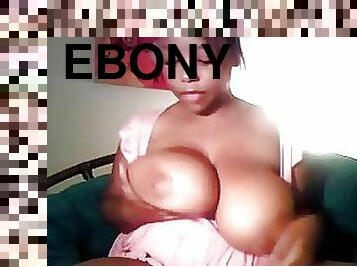 Ebony Slut Sucks and Tit Fucks a Dildo Before Masturbating On Webcam
