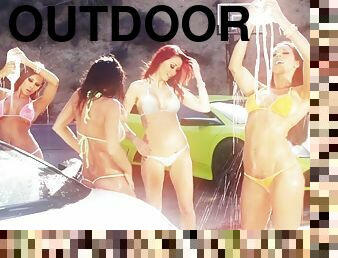 Four bikini car wash babes fuck him and eat pussy in outdoor orgy