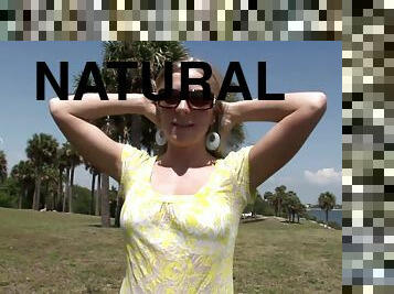 Blonde pulls out her big natural breasts in the public park