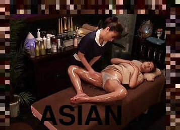 Alluring Asian lesbian enjoys an oily massage with a happy ending