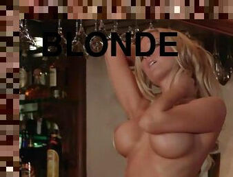 Blonde cutie Natalie Kane has a photosession in a bar