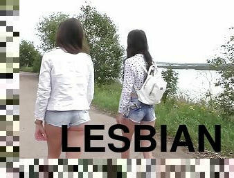 Pair of lesbians find a secluded place on the beach and play