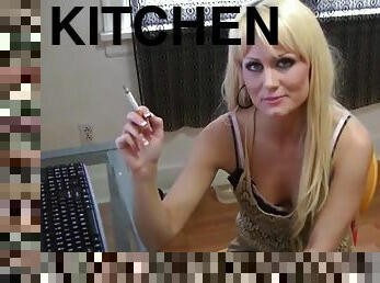 Allegra smoking in the kitchen