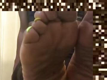 Ebony oiled up relaxed feet