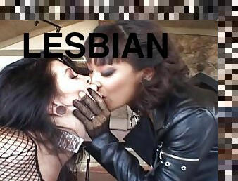 Lesbians in leather and fishnet enjoy licking and teasing their pussies