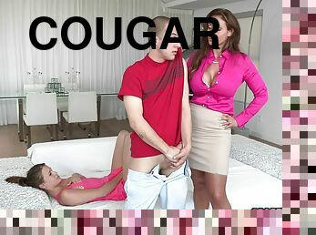 A cougar shows a teen babe how to suck and ride a hard cock