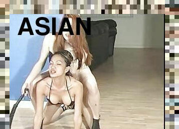 Asian babe gets her pussy licked out by a hot redhead