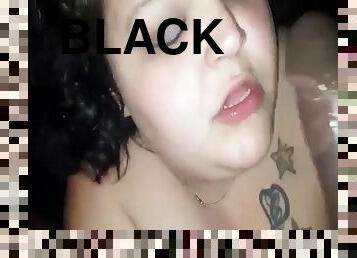 Fat white slut sucking on a long black cock
