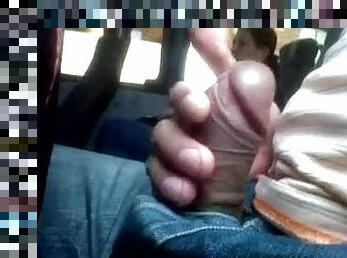 A crazy dude jerks his dick off in a bus and films himself