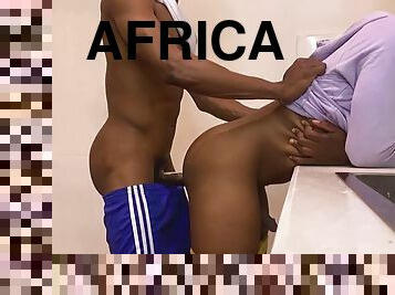 Horny African boys filmed sex in the kitchen