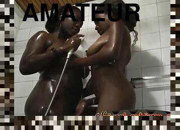 Amateur African lesbians lick cunts in shower