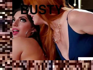 Busty redhead babe licked by her horny lesbian gf