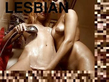 Two beautiful lesbians having a licking session in the shower