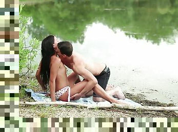 Sensual teen tries sex by the lake