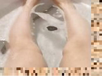 Legs in the bathroom footjob