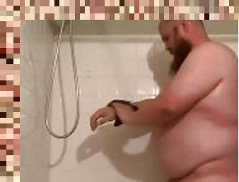 Hot bear plays in shower
