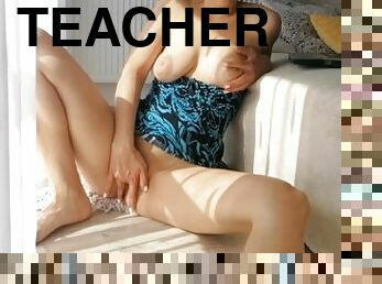 Naughty teacher gives an online masturbation show to her student