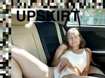 Naughty babe masturbating in car