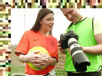 A sexy soccer girl fucks her coach on the field after practice