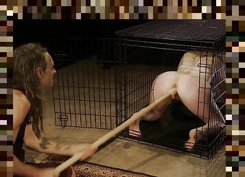 He opens her cage just so he could use his dildo pole
