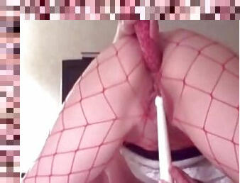 Sexy amateur chick in red fishnet pokes her anal