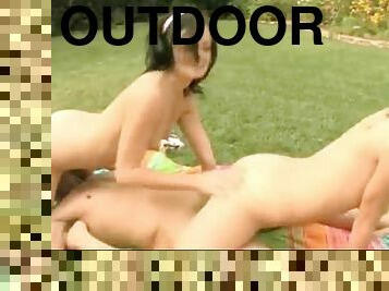 Dreamy threesome with teens outdoors