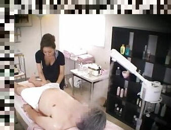 Massage parlor hidden camera with a sexy Japanese woman