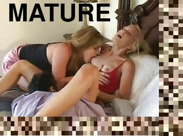 He joins two tasty ladies in bed for a threesome