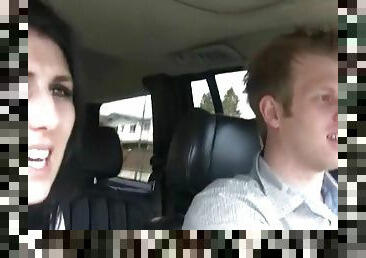 Couple in the car films their chatty fun