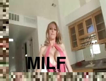 Milf with big boobs and big ass in a hot tease