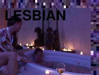 She climbs out of the bathtub and joins her lover for hot lesbian sex