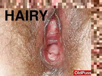 This hairy mature cunt is up on the exam table and getting some insertions