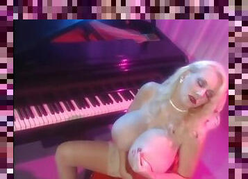 Kayla Kleevage is a hot retro milf blonde with very big tits