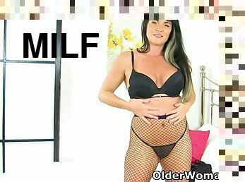 Fishnet tights get Milf Leah in the mood
