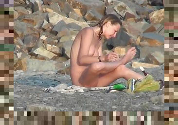 naked blonde undresses and showers in front of group on beach NFCM