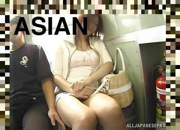 Asian chick with huge tits getting her pussy fingered on a train